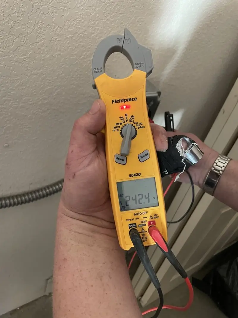 Voltage testing with clamp meter during Aluminum Wiring Replacement in Lansing